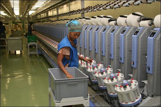 Automatic cone winding and package finishing